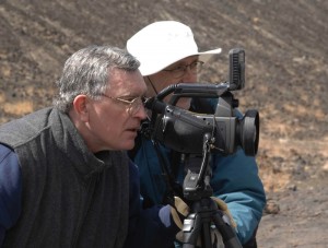 Benjamin Hulsey filming in the Mojave desert with a NASA team member